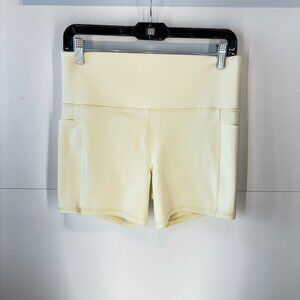 Athleta Limited Edition Salutation Stash High Rise 5" Shorts in Glow